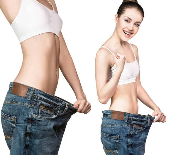 Ung smal kvinna i överdimensionerade Blå jeans — Stockfoto