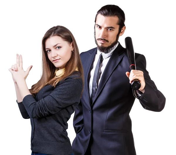 Woman gesturing gun man with bat — Stock Photo, Image