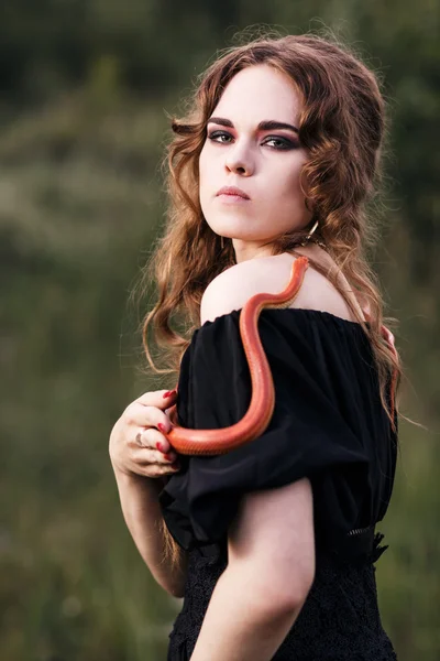 Woman with snake — Stock Photo, Image