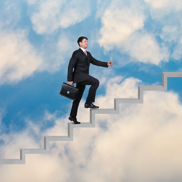 Businessman walking upstairs — Stock Photo, Image