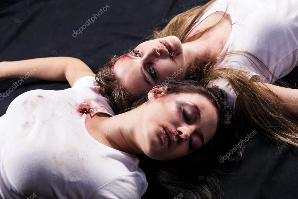 Two young women after domestic violence