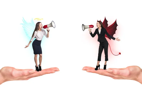 Portrait of angel and devil girls — Stock Photo, Image