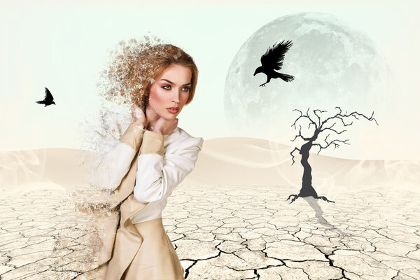 Beautiful woman in desert