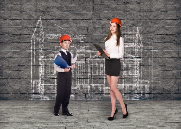 Little boy and woman builder — Stock Photo, Image