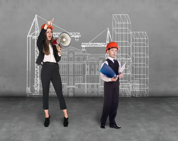 Little boy and woman builder — Stock Photo, Image