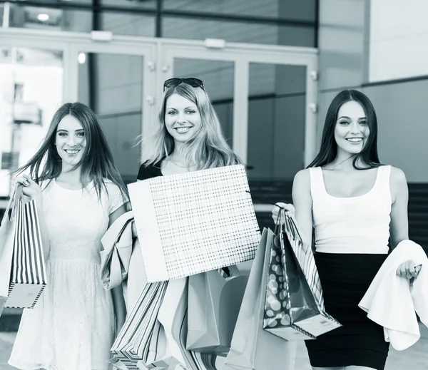 Young women after shopping — Stock Photo, Image