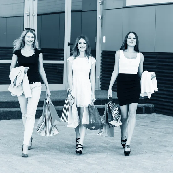 Young women after shopping — Stock Photo, Image