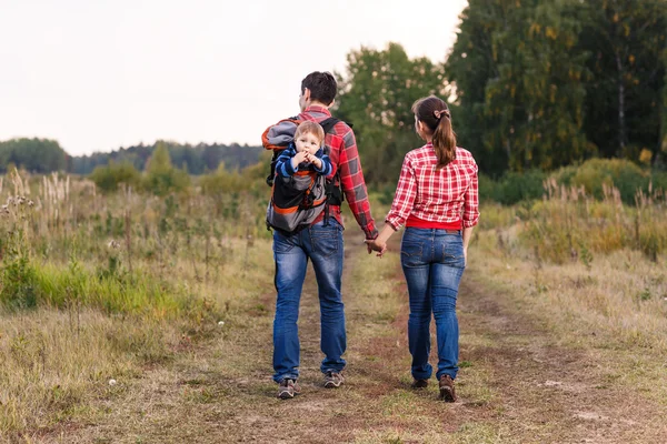 Baby boy in backpack — Stock Photo, Image