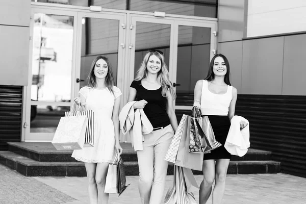 Young women after shopping — Stock Photo, Image