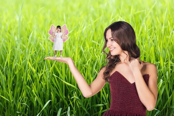Lady with a fairy — Stock Photo, Image