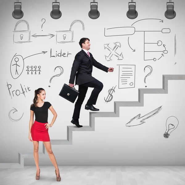 Businessman walking upstairs — Stock Photo, Image