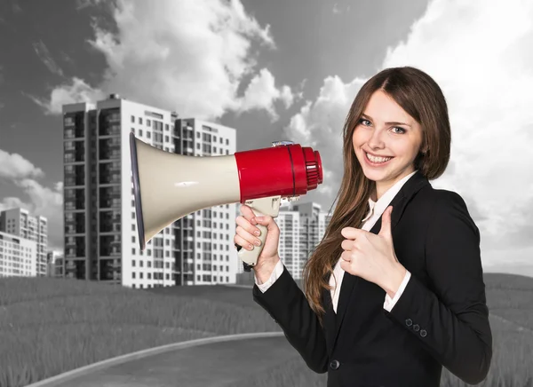 Woman speaking in megaphon — Stock Photo, Image