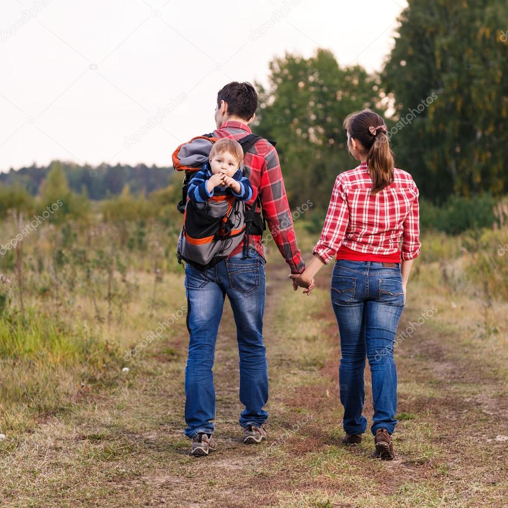 Baby boy in backpack Stock Photo by ©kotin 74327231