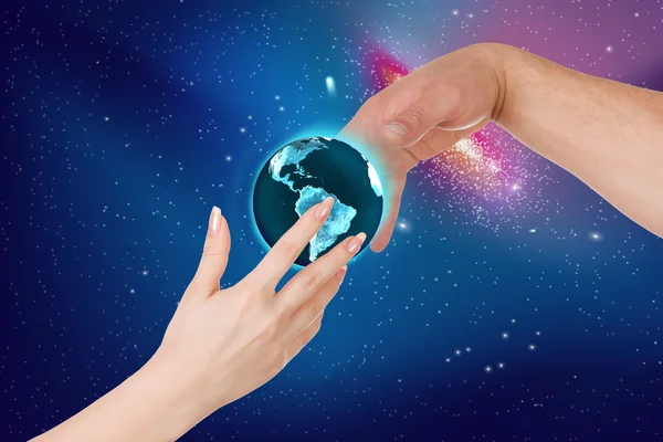 Woman gives a man planet Earth — Stock Photo, Image