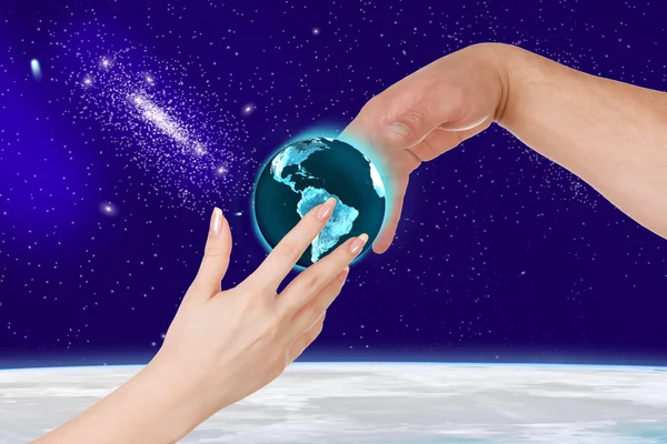 Woman gives a man planet Earth — Stock Photo, Image
