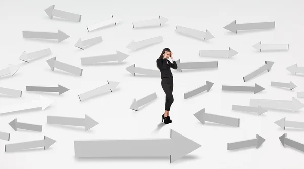 Girl looking at arrows — Stock Photo, Image