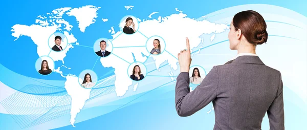 Businesswoman show on map — Stock Photo, Image