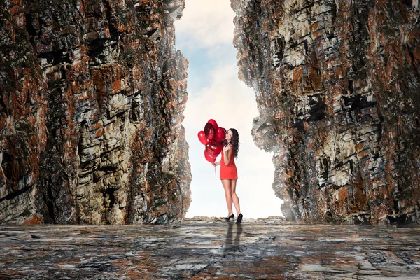 Woman in cave — Stock Photo, Image