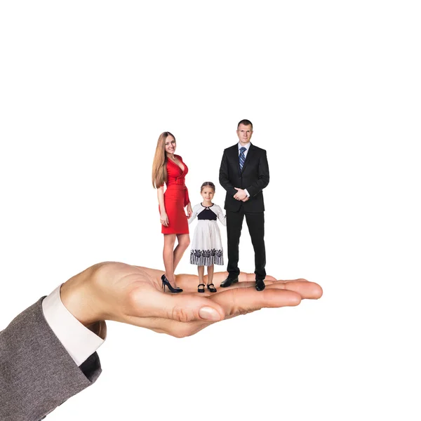 Familia feliz de pie en la mano — Foto de Stock