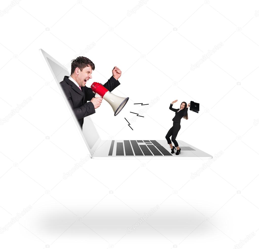 Businessman with megaphone get out of laptop