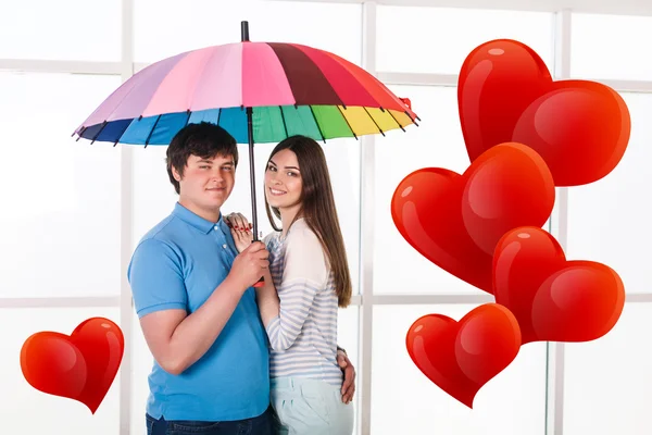 Par under ett paraply — Stockfoto