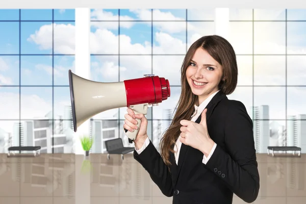 Mujer de negocios con megáfono y pulgares hacia arriba — Foto de Stock