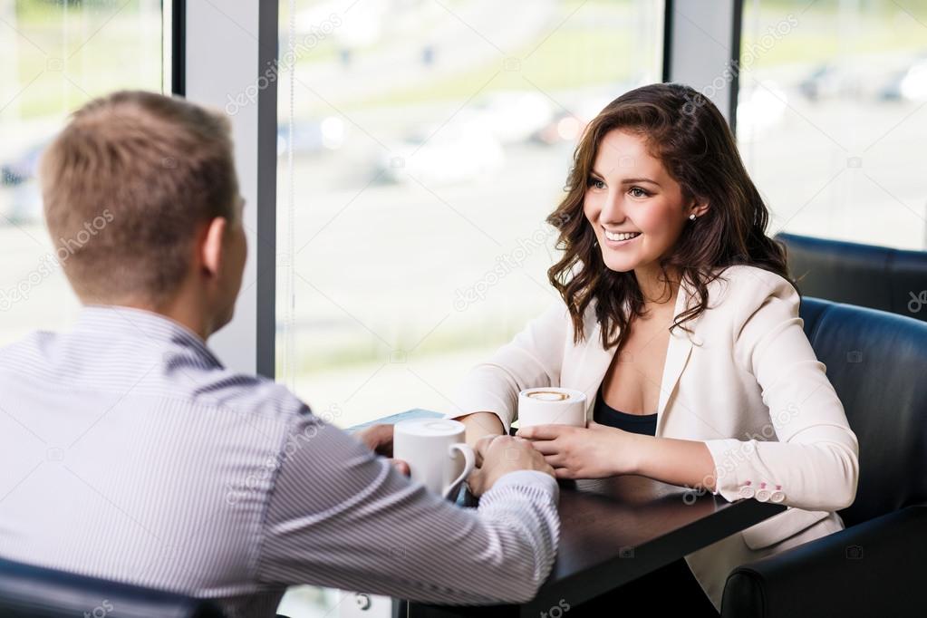 Couple sitting at a cafe