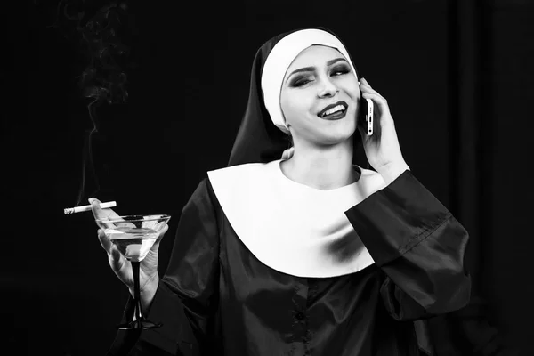 Smoking young nun — Stock Photo, Image