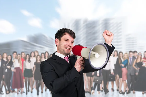 Persona de negocios está en primer plano — Foto de Stock