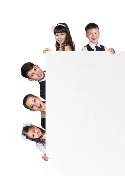 Krásná zábava rodina za bílé prázdné — Stock fotografie