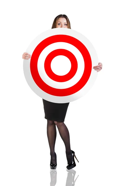 Business woman holding big target — Stock Photo, Image