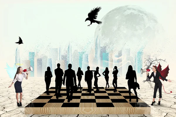 Silhouettes of people on the chess-board — Stock Photo, Image