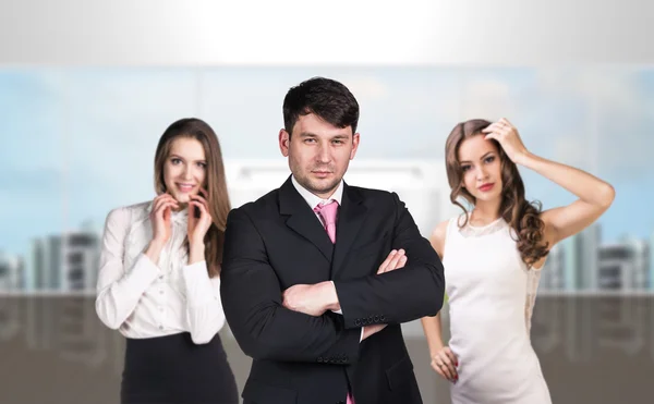 Several business people stand in the hall — Stock Photo, Image