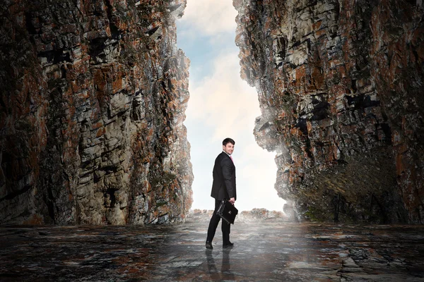 Business person in the cave — Stock Photo, Image