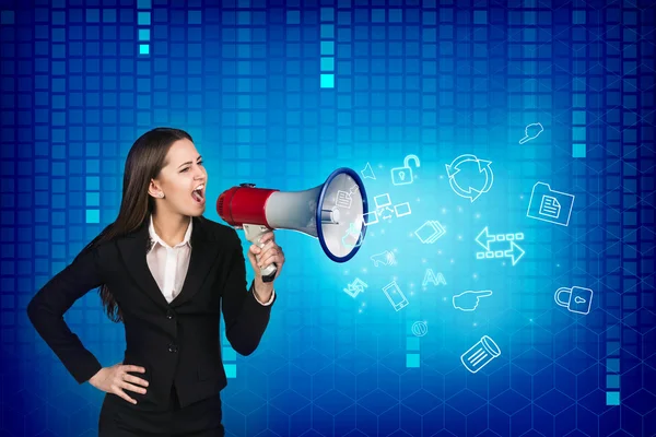 Business woman with megaphone is yelling — Stock Photo, Image