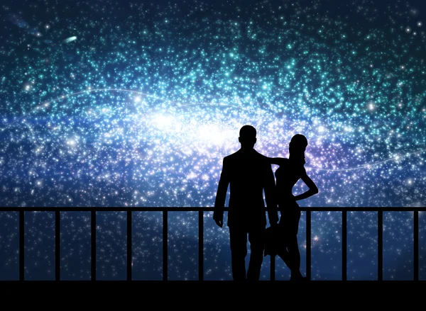 Silhuett av par står i kosmos — Stockfoto