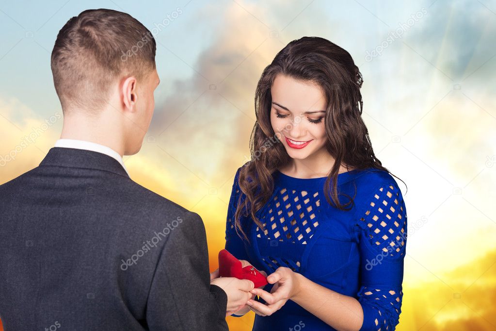 Young man makes a proposal to his girlfriend