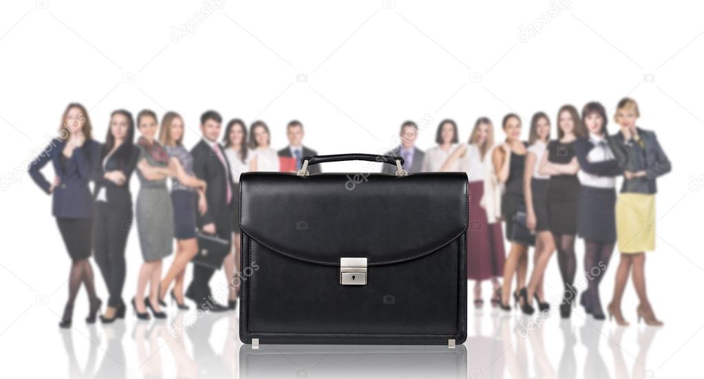 Black briefcase foreground and business peole