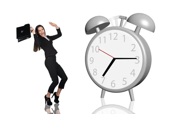 Mujer de negocios asustado gran reloj despertador gris — Foto de Stock