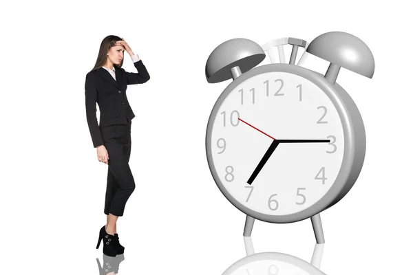 Mujer de negocios tiene un dolor de cabeza.Reloj despertador — Foto de Stock