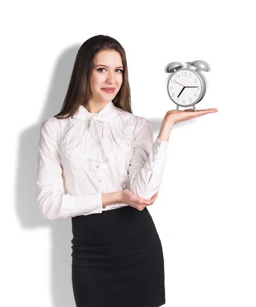 Business woman holding väckarklockan — Stockfoto