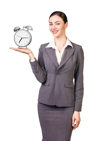 O femeie de afaceri care ţine ceasul deşteptător — Fotografie, imagine de stoc