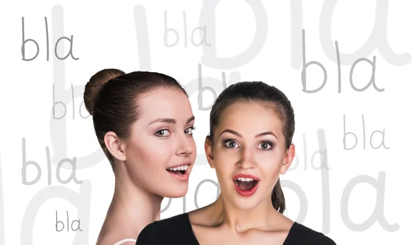 Two beautiful women gossiping — Stock Photo, Image