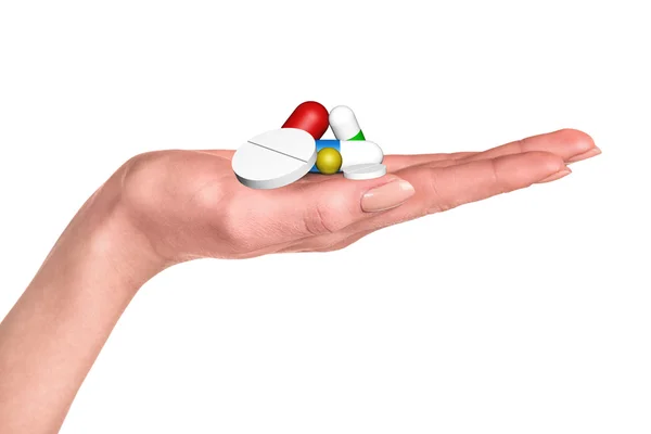Medikamentenkapseln und Pillen in der Hand — Stockfoto