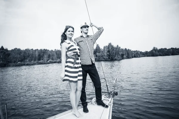 Couple posing on the yacht — Stock Photo, Image