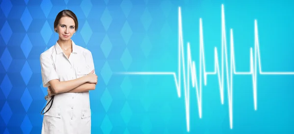 Woman doctor stands near pulse line — Stock Photo, Image