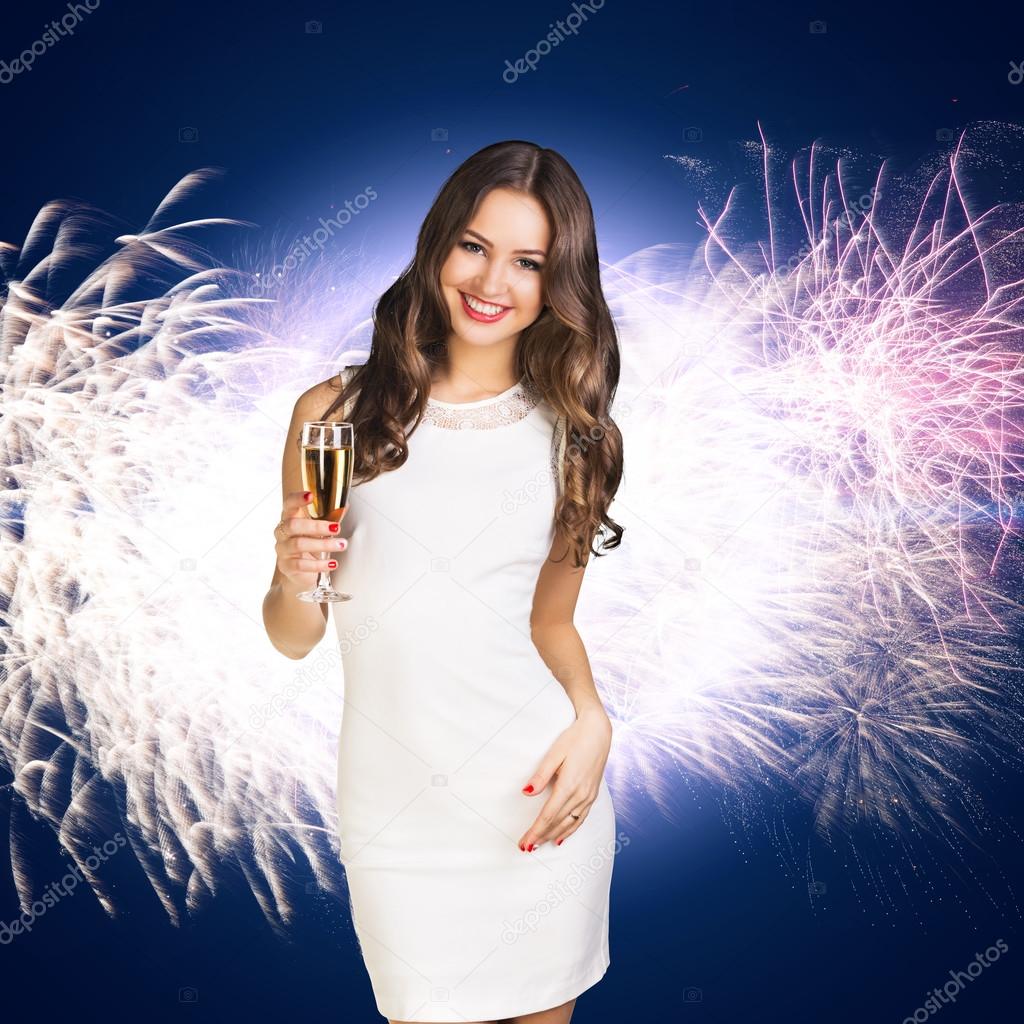 Young woman in white dress with champagne