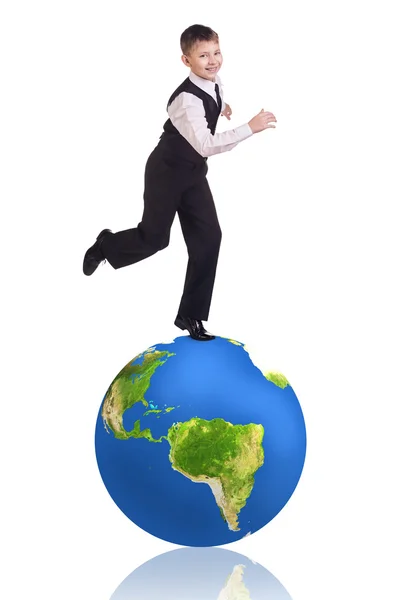 Little boy stands on the big earth. — Stock Photo, Image