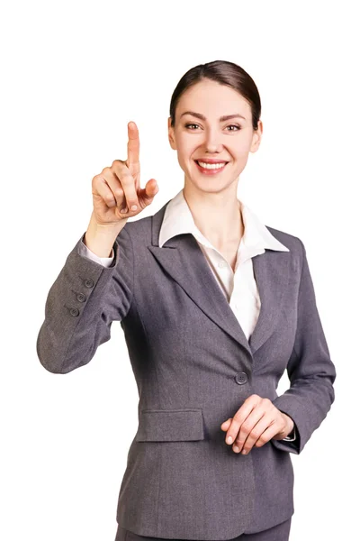 Brunette businesswoman showing forefinger — Stock Photo, Image