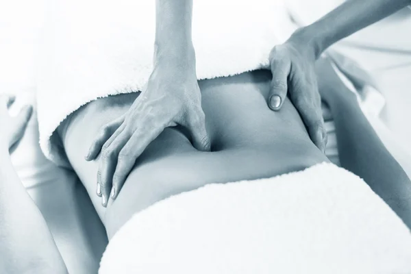 Woman having abdomen massage. — Stock Photo, Image